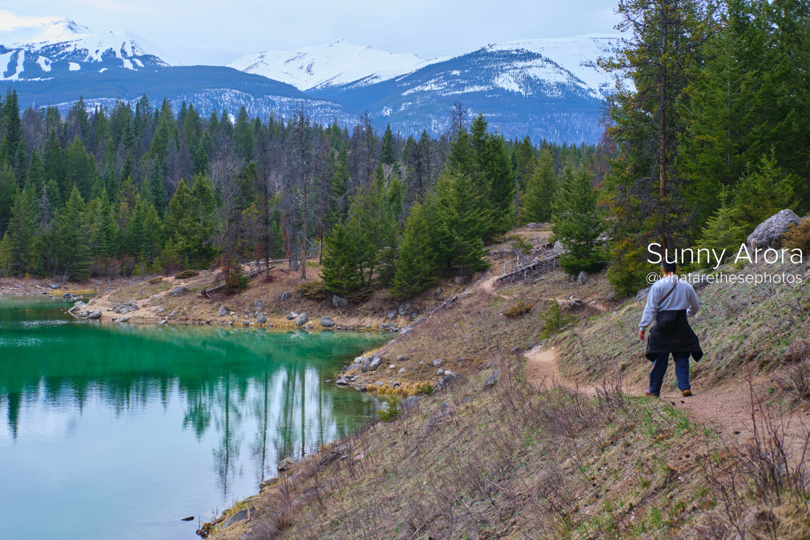 Walking on a trail next to a beautiful lake